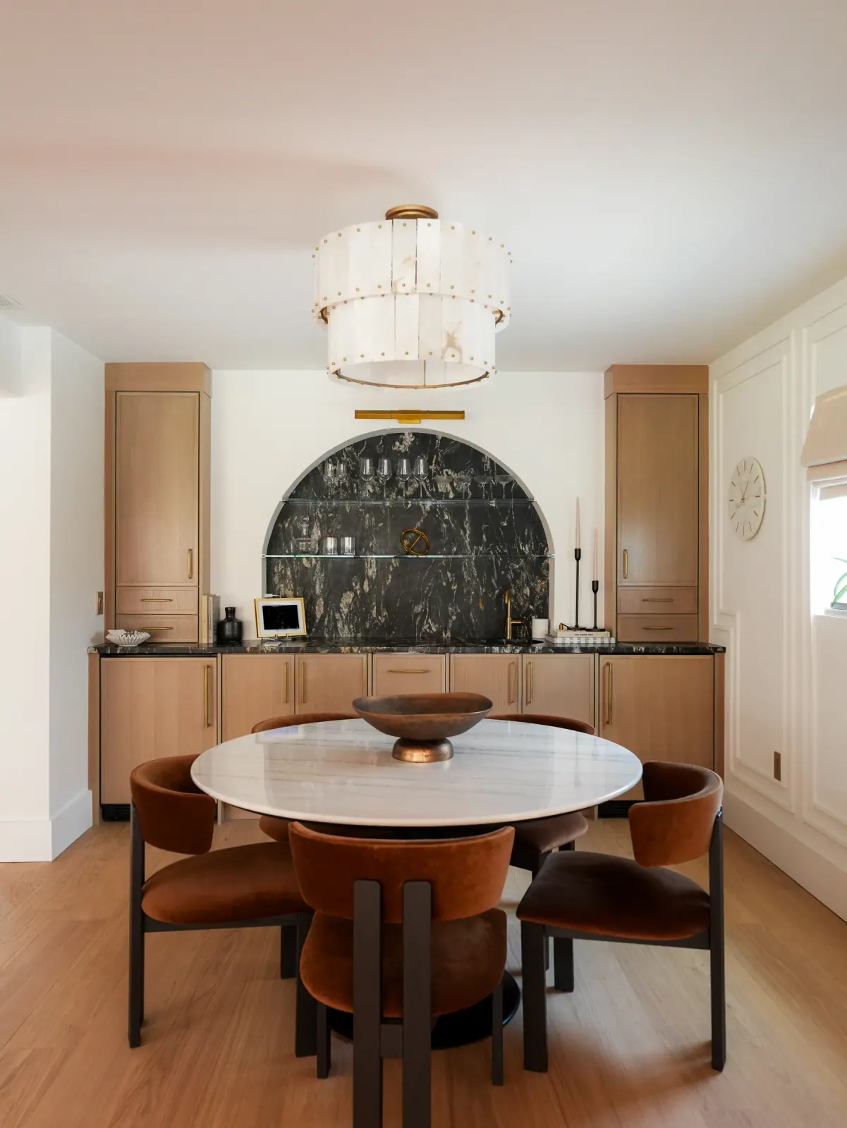 Dining room with an arched wet bar
