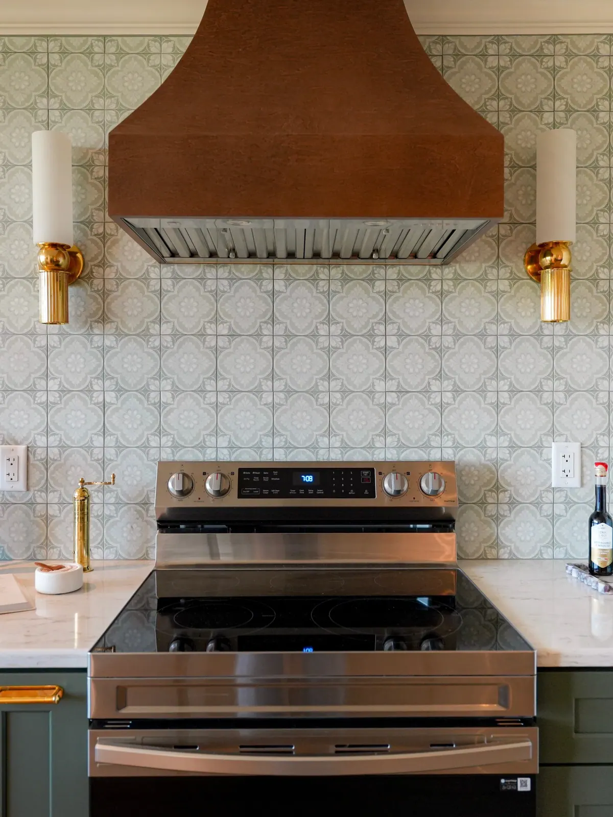 Hand-finished copper hood above a stainless range